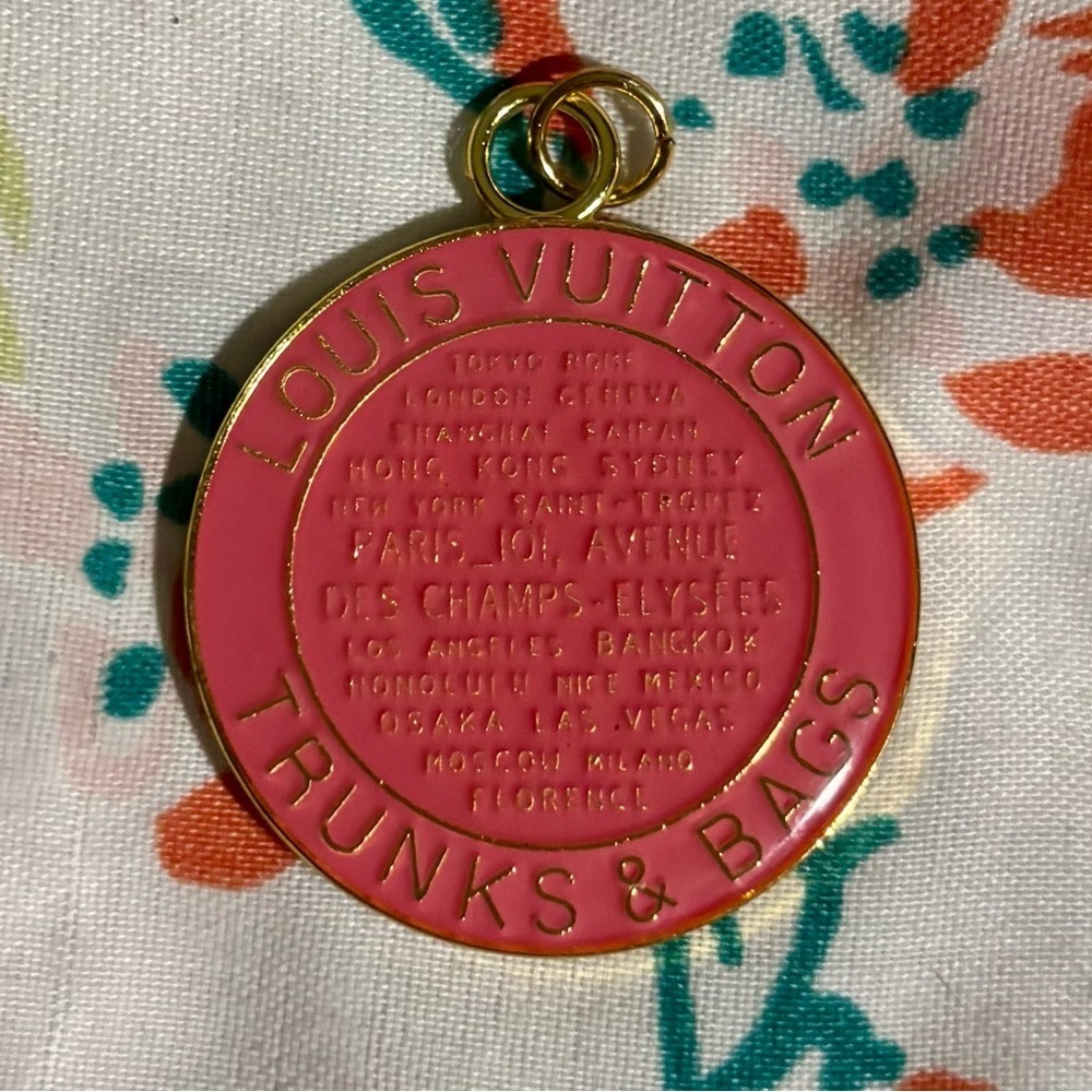 Louis Vuitton Pink and Gold City Medallion